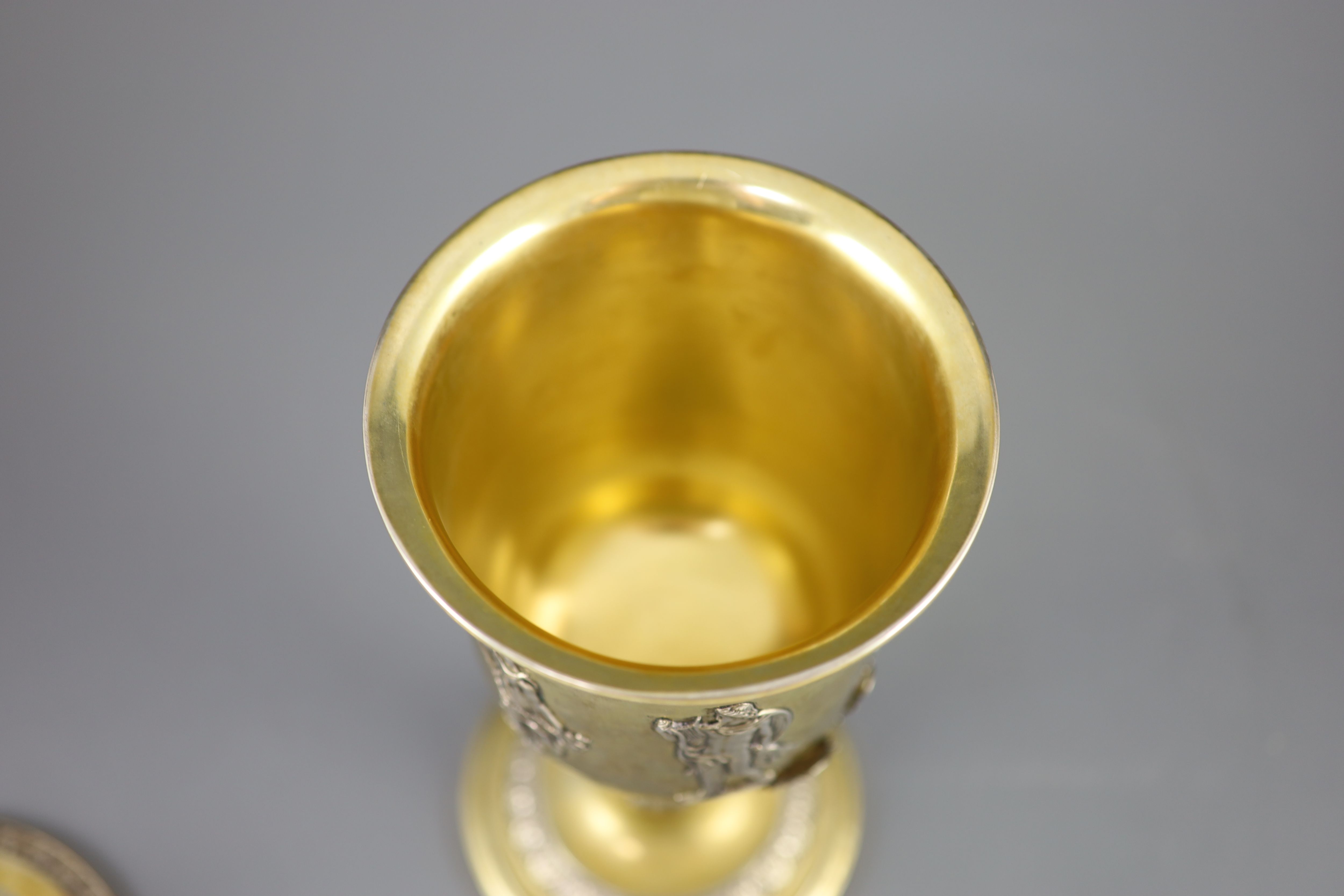 A late 19th/early 20th century German parcel gilt 800 standard presentation pedestal cup and cover, by Wollenweber,